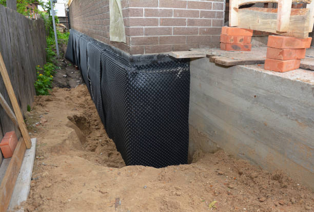 SJ Waterproofing Pros technician performing targeted Basement Waterproofing assessment in Stevenson, WA